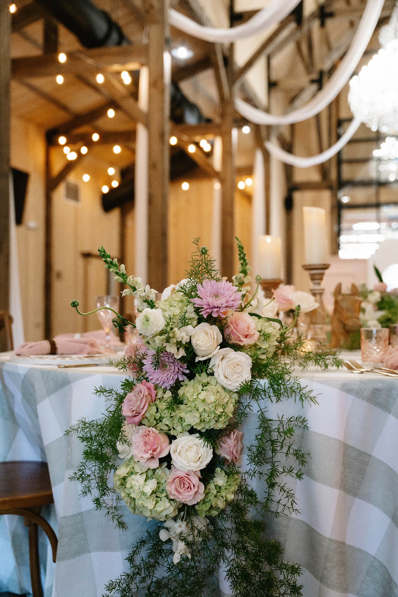 Floral runner on a barn table